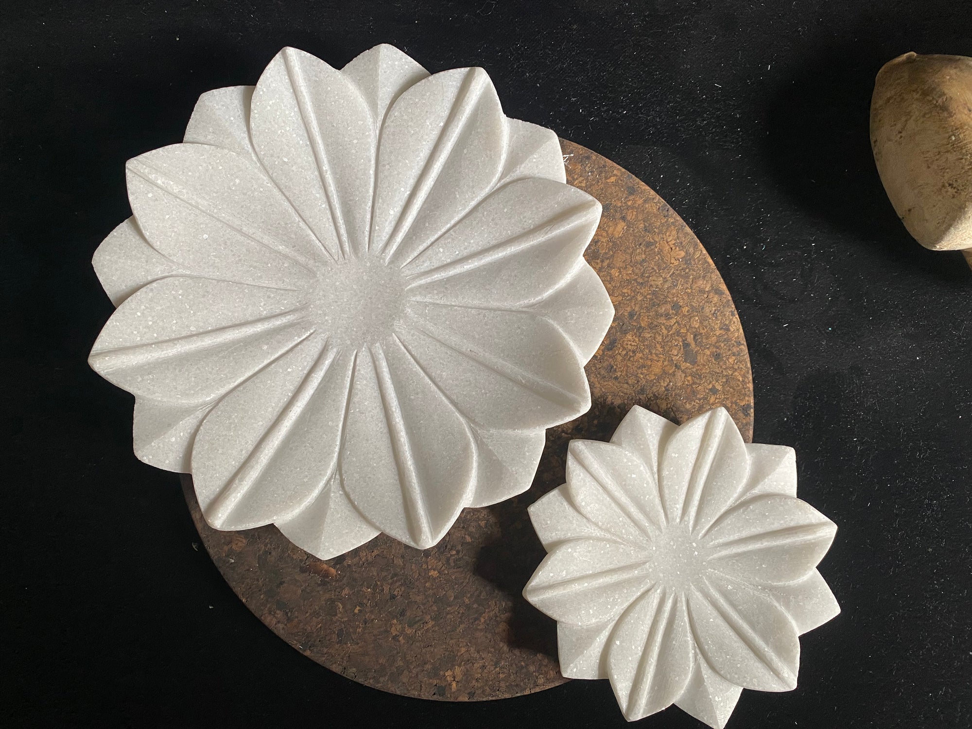 Hand crafted shallow bowls or plates, hand carved in Rajasthan from the finest local white marble in the form of an open lotus flower. Select from two sizes. Small 16 cm diameter, Large 26 cm diameter