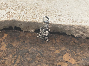 Our smallest Lord Ganesha silver pendant. A generous bail allows this pendant to be worn on a large chain or cord. This is a unisex pendant. Sterling silver, from India Measurements: 2.2 cm height including bail, width 1 cm