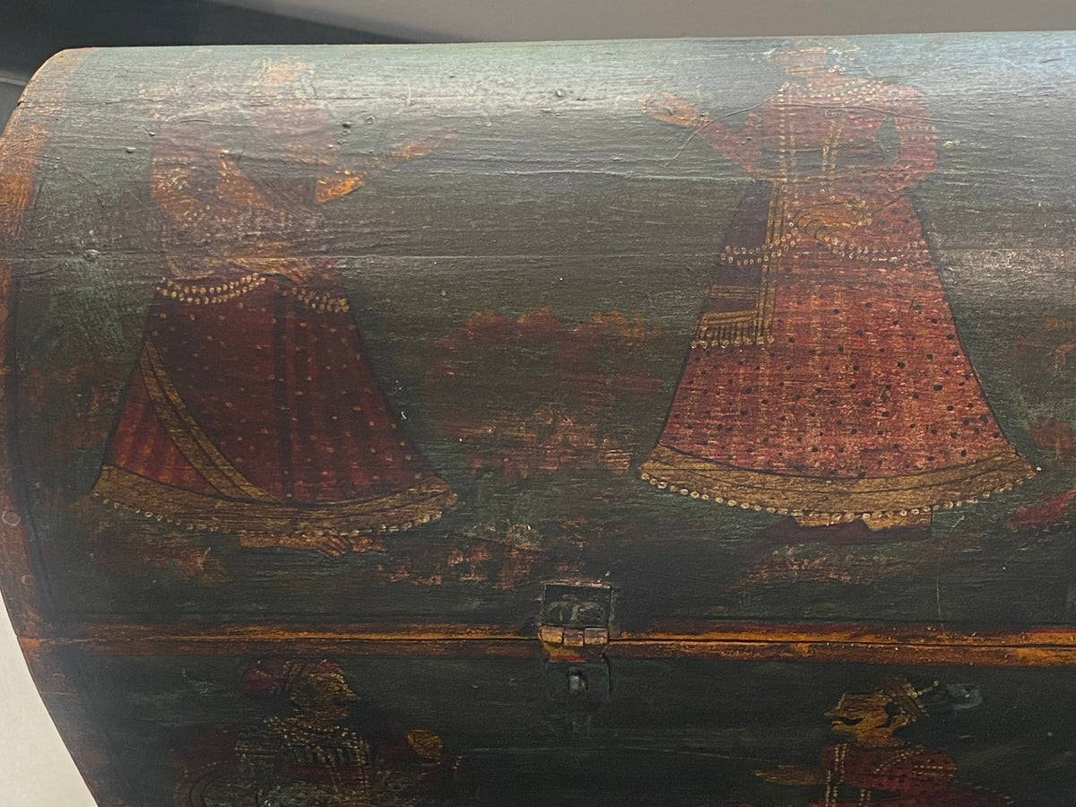 A lovely old painted Indian chest with domed top in the shape of a treasure chest. Painted on all sides with images of Indian lords and ladies. Made from teak. This would make a lovely trinket box, key box, jewellery, watch or cufflink box. Circa 1940. Measurements: length 24 cm x depth 15.5 cm, height 16 cm