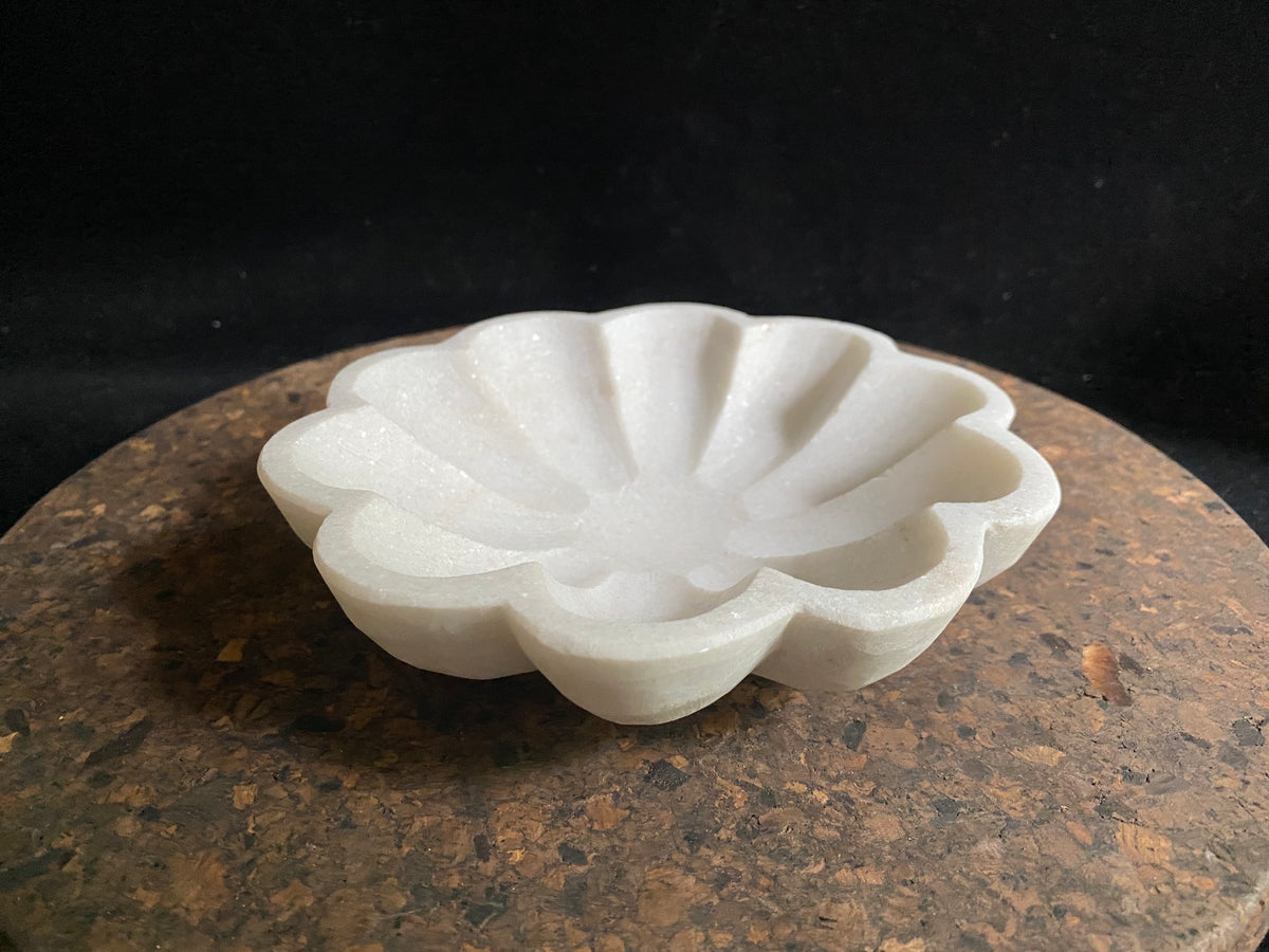 Hand carved, scallop edged bowls, carved from the finest local white marble. Simple, elegant, practical, natural stone. Measurements 15.5 cm diameter, height 3 cm