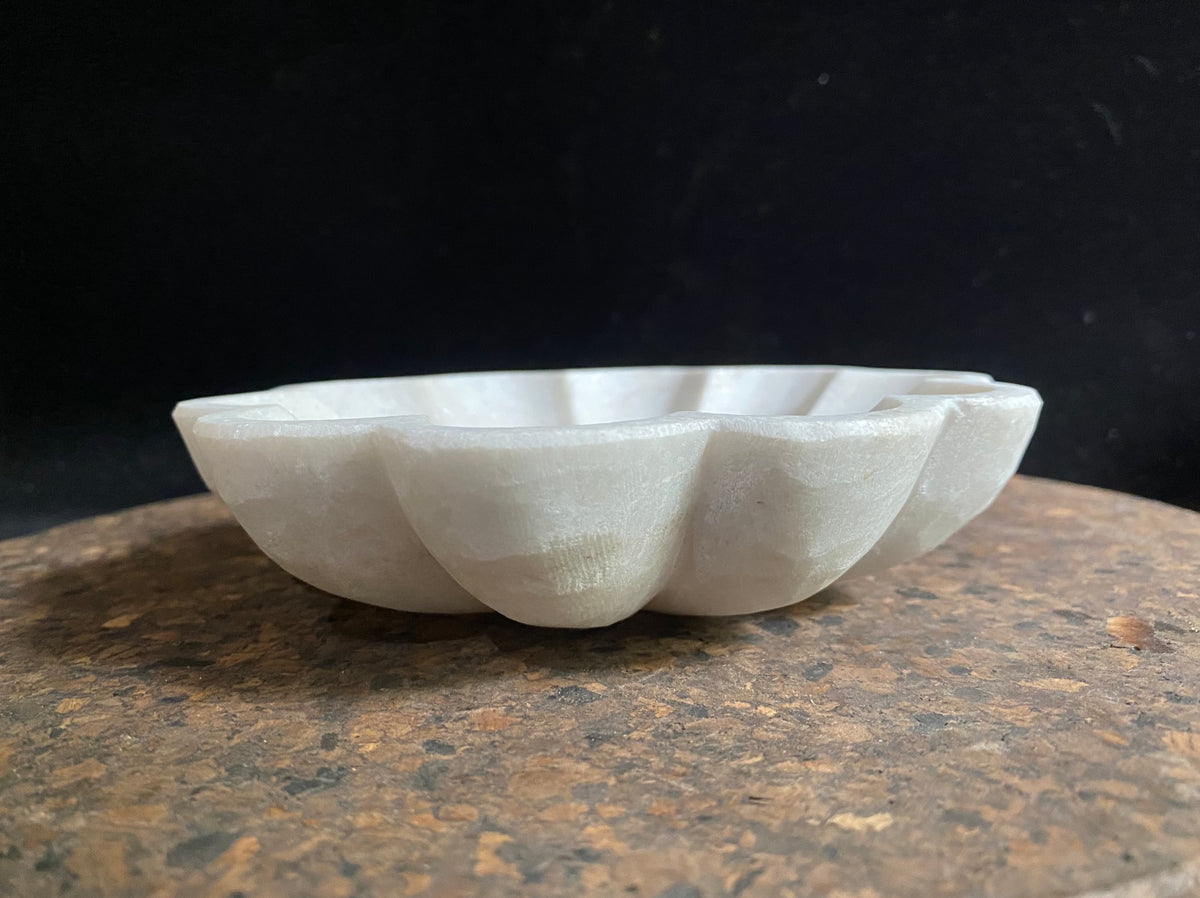 Hand carved, scallop edged bowls, carved from the finest local white marble. Simple, elegant, practical, natural stone. Measurements 15.5 cm diameter, height 3 cm
