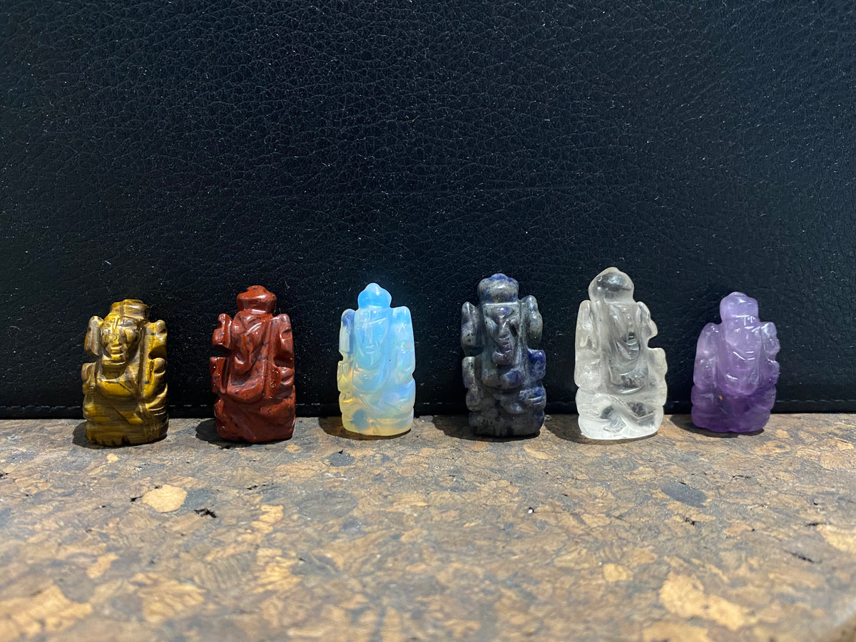 Hand carved from luminous gemstone, these are the perfect small Ganesh statue for travelling, if you're short on space or like to keep Ganesh with you at all times. Select the one you like best from the drop down menu. Range in size from 2.5 - 3 cm