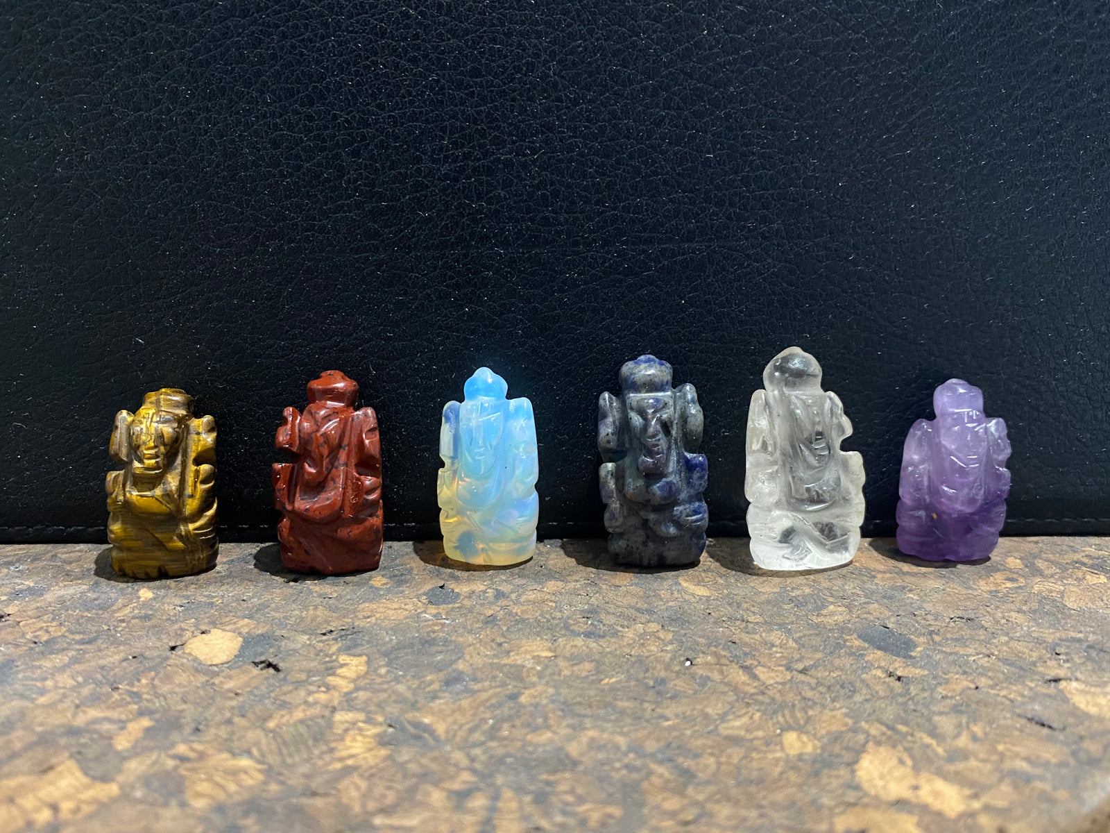 Hand carved from luminous gemstone, these are the perfect small Ganesh statue for travelling, if you're short on space or like to keep Ganesh with you at all times. Select the one you like best from the drop down menu. Range in size from 2.5 - 3 cm
