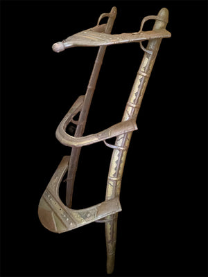 Antique camel saddle, Rajasthan, India. Early 20th century. Brass and Iron over hardwood.
