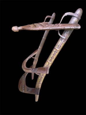 Antique camel saddle, Rajasthan, India. Early 20th century. Brass and Iron over hardwood.
