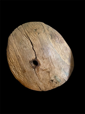 Antique solid teak wood cart wheel, rural India, early 20th century. Natural age and texture, central iron spoke hole and staples. Diameter 73 cm, depth 20 cm