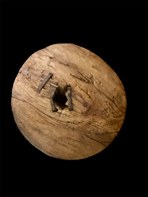 Antique solid teak wood cart wheel, rural India, early 20th century. Natural age and texture, central iron spoke hole and staples. Diameter 73 cm, depth 20 cm