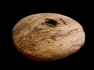 Antique solid teak wood cart wheel, rural India, early 20th century. Natural age and texture, central iron spoke hole and staples. Diameter 73 cm, depth 20 cm