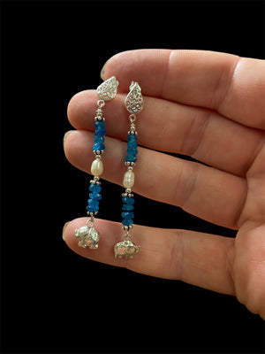 Apatite earrings with pearl detailing, finished with sterling silver elephant charms. Sterling post and butterfly mount. Measurements: 6 cm height