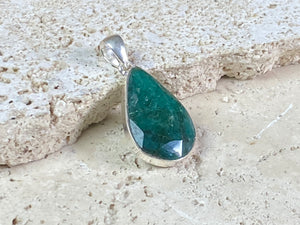 Six lush natural emerald pendants featuring large facet cut stones set in sterling silver. All are set with generous bails to fit on even the largest of chains, torcs or cords. Ranging in length from 6 cm to 2.8 cm