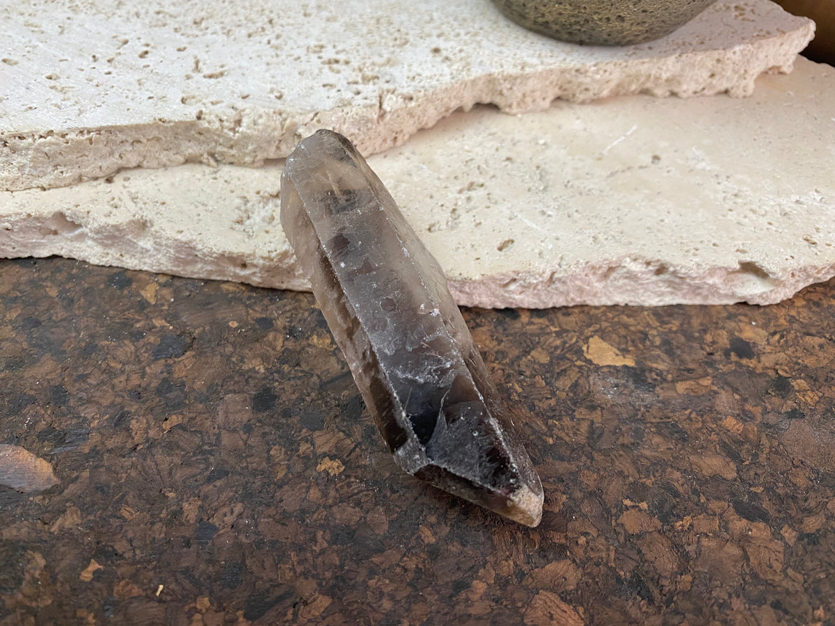 Natural smokey quartz crystal points.  Measurements: our crystals are approximately 8 cm in  length