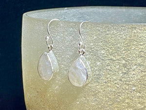 Our stunning, classic teardrop earrings feature high quality, large facet cut teardrop rainbow moonstone stones set in a simple sterling silver bezel.

Measurements: 3 cm (1.35”) length including hook&nbsp;