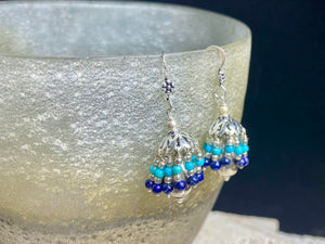 Tassel earrings, also called umbrella earrings or jhumpka earrings. Sterling silver, lapis lazuli and turquoise. Height .5 cm including hook