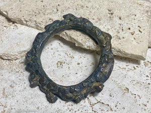 Antique Bronze Dông Son bracelet, Vietnam. Solid cast bronze bangle featuring an array of animals. Inside diameter 25 cm. Height 1.3 cm.
