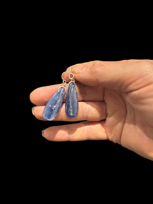 Simple kyanite earrings, featuring stones cut in a flat teardrop shape. Sterling silver hooks complete the look. Length including hook 4.5 cm