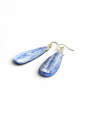 Simple kyanite earrings, featuring stones cut in a flat teardrop shape. Sterling silver hooks complete the look. Length including hook 4.5 cm