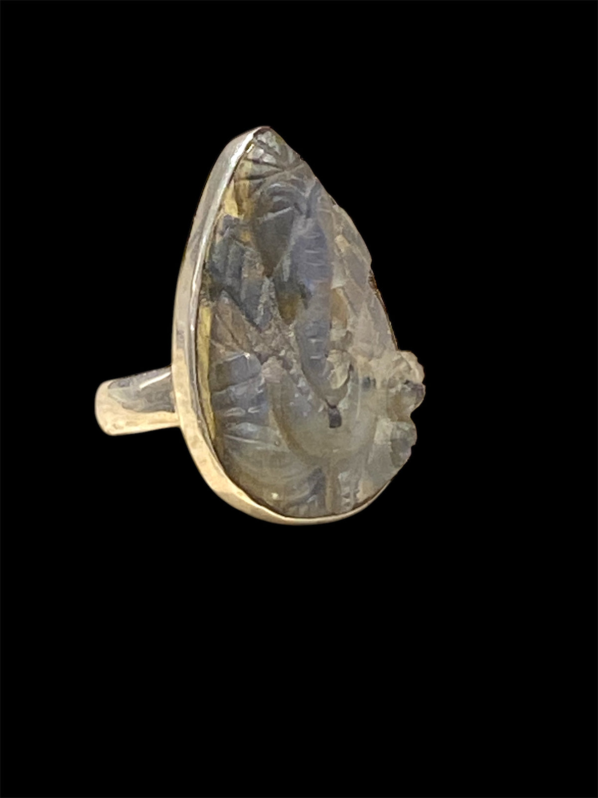 Hand carved labradorite ring with excellent fire featuring Ganesh. Sterling silver. A high quality stone with excellent colour. Stone 3 cm. Size 6.5
