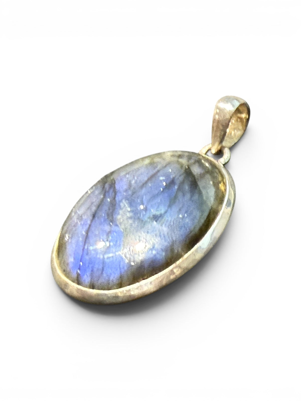 Large flat oval clear labradorite pendant set in sterling silver with a generous bail to take a large chain or cord. Length including bail 4.3 cm, width 2.3 cm