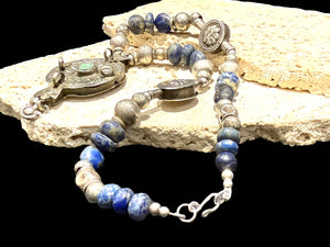 Unique statement necklace crafted from antique Afghani lapis, Indian tribal beads, old silver Uzbeki beads & an antique Tibetan centrepiece. Length 46.3 cm