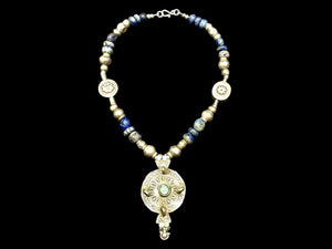 Unique statement necklace crafted from antique Afghani lapis, Indian tribal beads, old silver Uzbeki beads & an antique Tibetan centrepiece. Length 46.3 cm