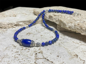 Simple and elegant, our medium length necklace is made from deep blue Afghan lapis lazuli and sterling silver, with a sterling silver clasp. Length 48 cm (19")