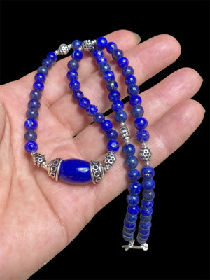 Simple and elegant, our medium length necklace is made from deep blue Afghan lapis lazuli and sterling silver, with a sterling silver clasp. Length 48 cm (19")