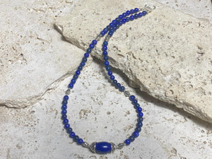 Simple and elegant, our medium length necklace is made from deep blue Afghan lapis lazuli and sterling silver, with a sterling silver clasp. Length 48 cm (19")