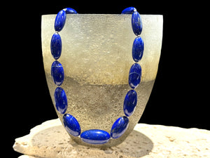 Simple and elegant, this longer length necklace is made from deep blue, AAA grade Afghan lapis lazuli and sterling silver beads, finished with sterling silver findings. Measurements: Length 48 cm (19")