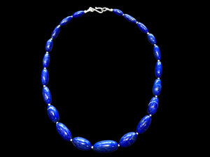 Simple and elegant, this longer length necklace is made from deep blue, AAA grade Afghan lapis lazuli and sterling silver beads, finished with sterling silver findings. Measurements: Length 48 cm (19")
