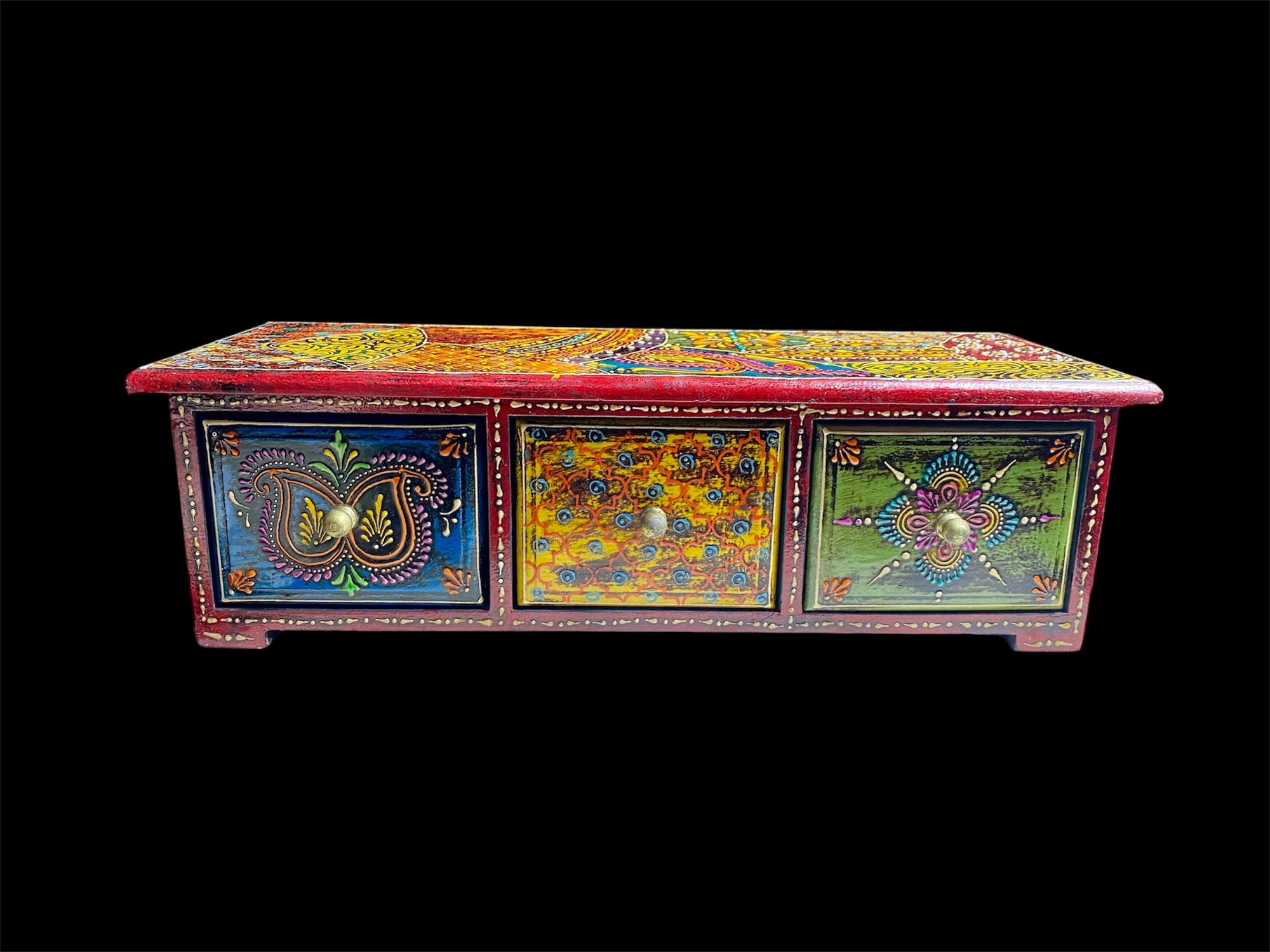 This intricately painted box features three spacious drawers, small feet and brass knobs as handles. The roominess of the drawers means our long, low chest is perfect for holding everything from trinkets to jewellery and essential oils. Width 34.5, depth 13 cm, height 10.5 cm