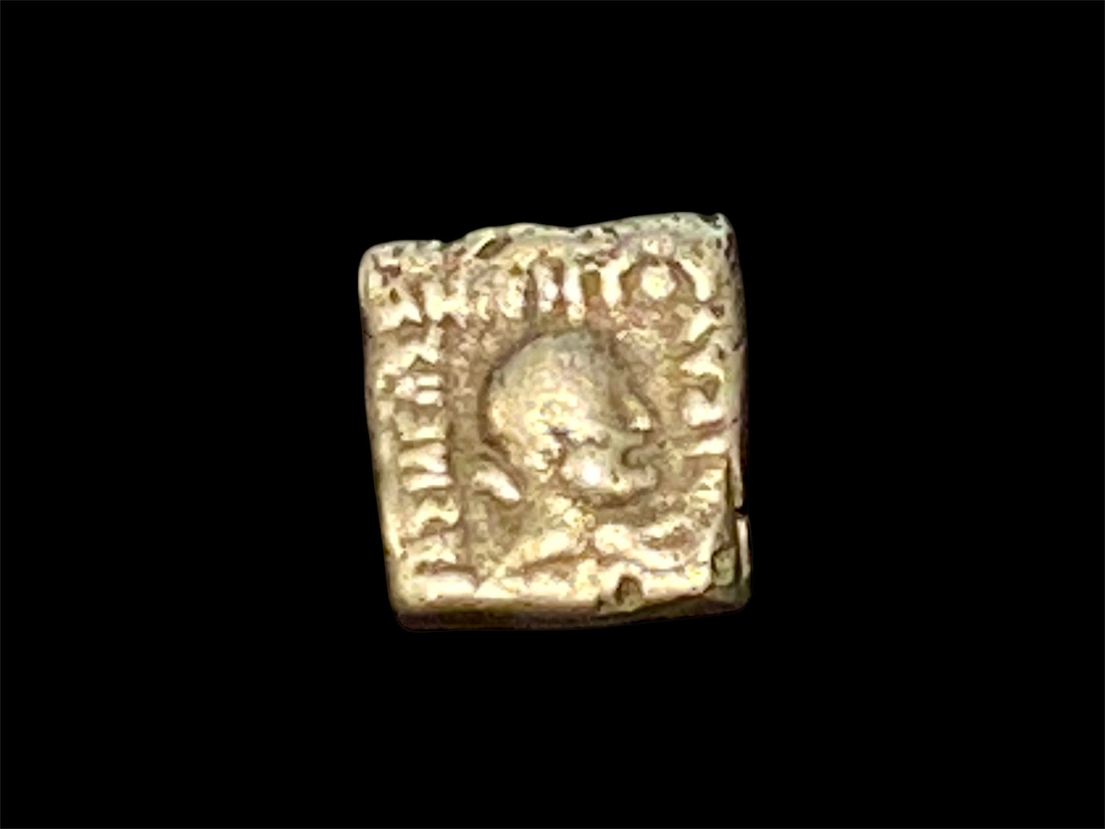 Indian square quadruple coin of Lysias Anikeitos, 130-125 BCE, AE (bronze), Herakles, holding club, Greek legend, Elephant, Kharoshthi legend. 19x17 mm, 7.49g
