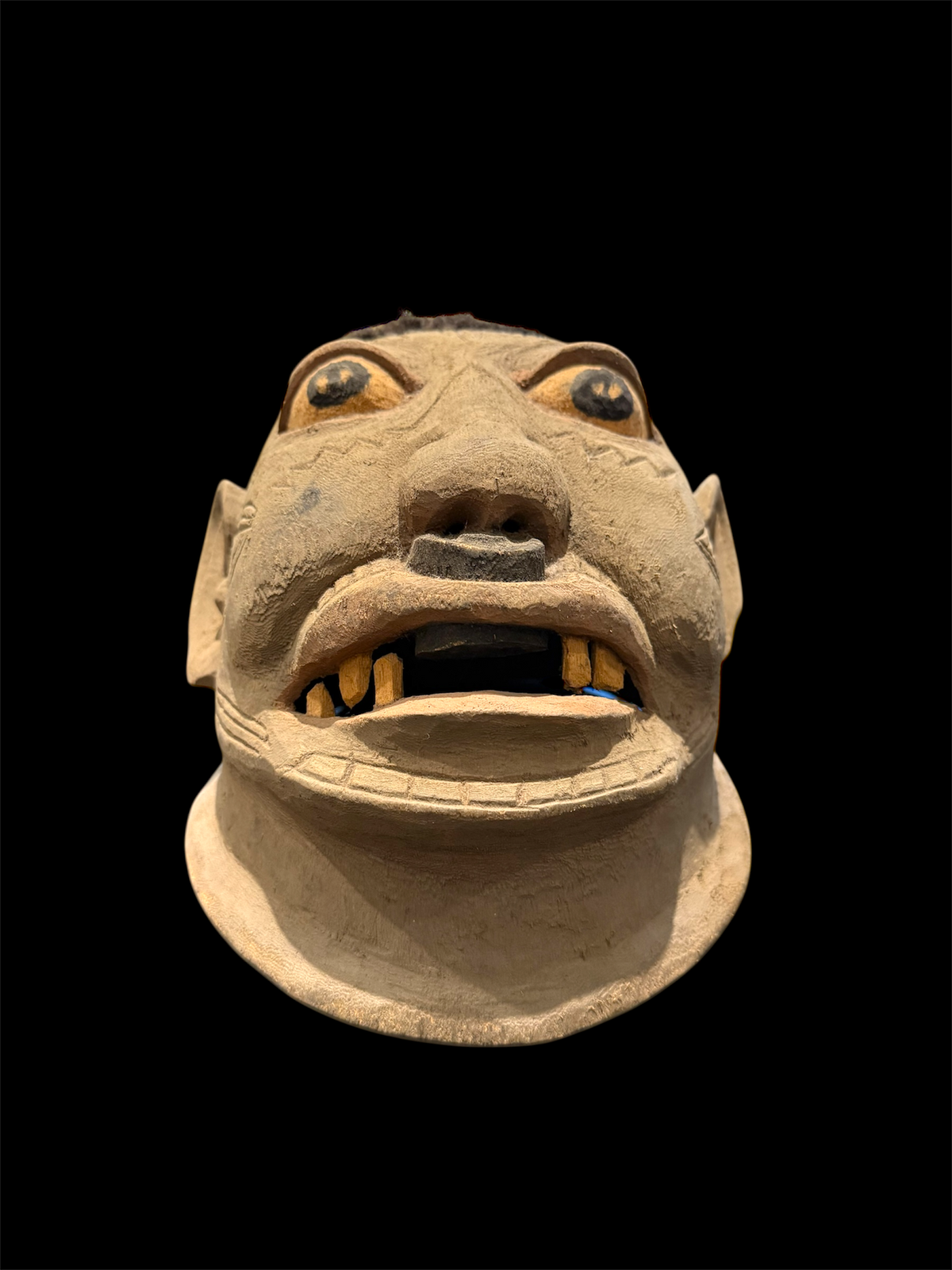 Makonde helmet mask. Balsa wood, human hair and pigment. Moda, Mozambique. Circa mid 90's. Worn in dances that conclude the initiation ceremonies for adolescent boys and girls. Measurements: length 24 cm, width 20 cm, height 22 cm