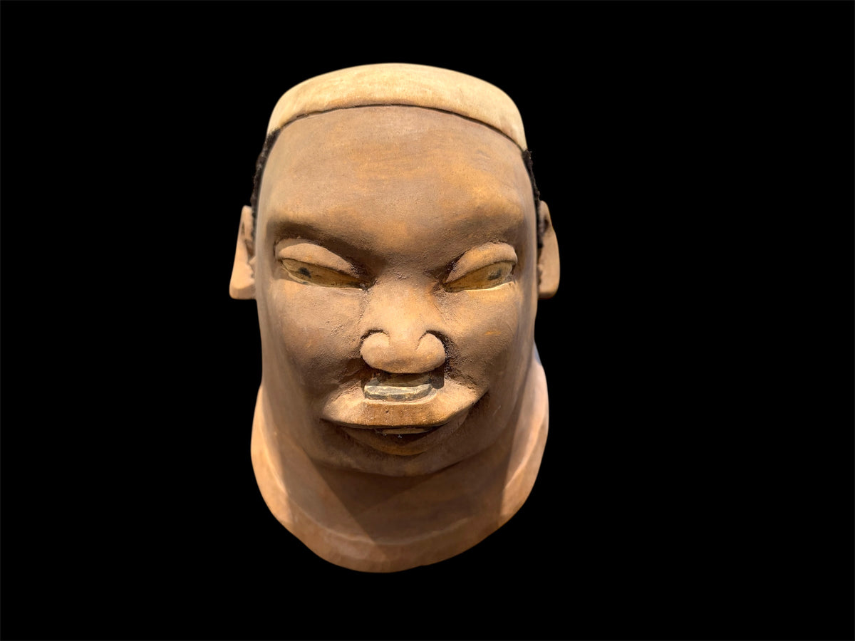 Makonde helmet mask. Balsa wood, human hair and pigment. Moda, Mozambique, Circa mid 90's. Worn in dances that conclude the initiation ceremonies for adolescent boys and girls. Measurements: length 25 cm, width 19 cm, height 20 cm