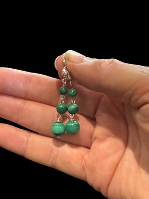 Malachite ball earrings. Finished with elegant sterling silver hooks and detailing. Length 4.7 cm including hook, largest bead 8 mm diameter
