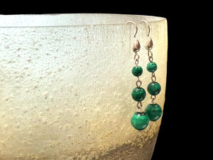 Malachite ball earrings. Finished with elegant sterling silver hooks and detailing. Length 4.7 cm including hook, largest bead 8 mm diameter
