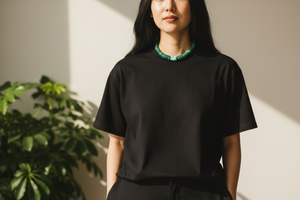 Unique choker of graduated heshi beads that showcase a stunning turquoise and malachite centrepiece. Sterling silver bead detailing and clasp. Length 40 cm