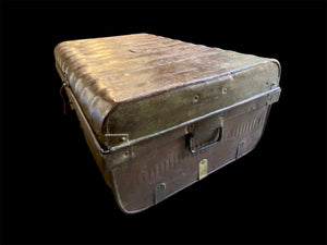 Antique metal trunk, once used by surveyors during the time of the Raj when roads and railways were being built all over India and were used to protect the surveyors' instruments. Late 19th 20th century, India. Measurements: height 27 cm, length 64 cm, depth 42 cm