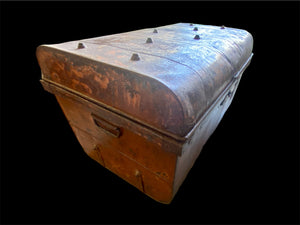 Antique metal trunk, used by surveyors during the Raj and used to protect the surveyors' instruments. This particular example is taller than most of these sorts of suitcases, and would make a lovely coffee table. Inside is the original owner's label. Height 41 cm, length 66 cm, depth 43 cm