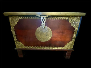 Hardwood coffee table chest with dual opening lid and brass decoration. This lovely and practical chest can be used as a side table, small coffee table or storage chest. It is stained brown-red and is finished with brass decoration. Both sides open. From Rajasthan, India. Measurements: 61 x 61 cm, height 46 cm.