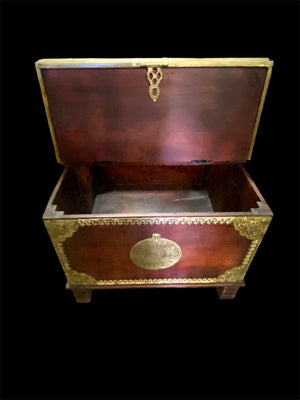 Hardwood coffee table chest with dual opening lid and brass decoration. This lovely and practical chest can be used as a side table, small coffee table or storage chest. It is stained brown-red and is finished with brass decoration. Both sides open. From Rajasthan, India. Measurements: 61 x 61 cm, height 46 cm.