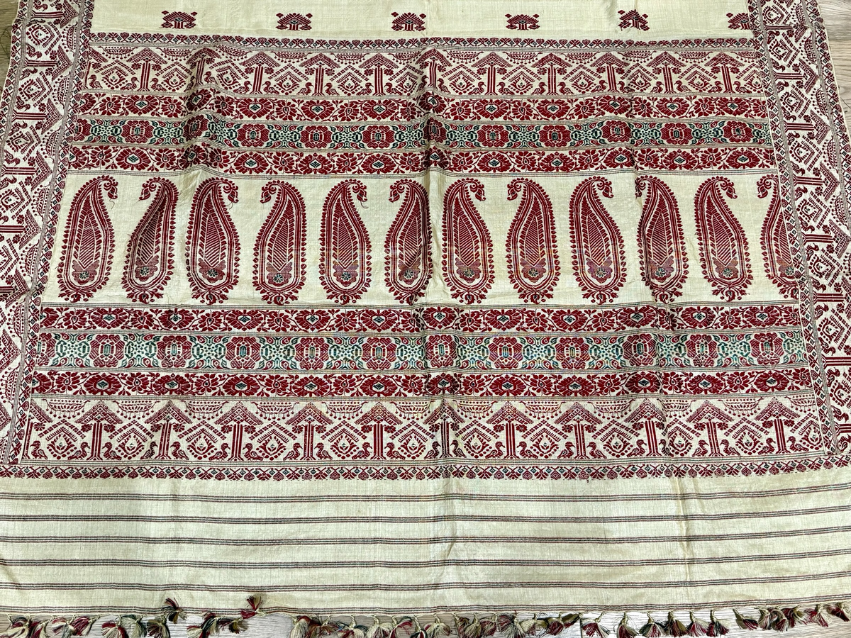 Hand loomed muga silk saree in two pieces. Guwahati region, Assam, northeast India. 100% muga silk in both warp and weft. Length 5.5 m x 109 cm