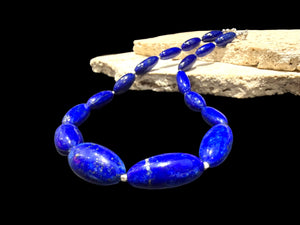 Simple and elegant, our short necklace is made from deep blue Afghan lapis lazuli and sterling silver, with a sterling silver clasp. Length 41.5 cm.