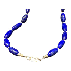 Simple and elegant, our short necklace is made from deep blue Afghan lapis lazuli and sterling silver, with a sterling silver clasp. Length 41.5 cm.