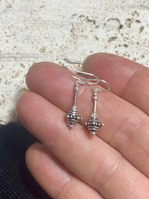 Sterling silver earrings featuring intricate, handmade tribal beads and silver hooks. Light and easy to wear, but these little earrings will make an impact. Length 2.8 cm including hook