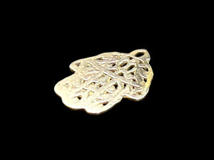Antique Tunisian silver hamsa amulet pendant. Cast openwork decoration, rounded outline, softened detail consistent with wear. Height 3.5 cm, width 2.6 cm