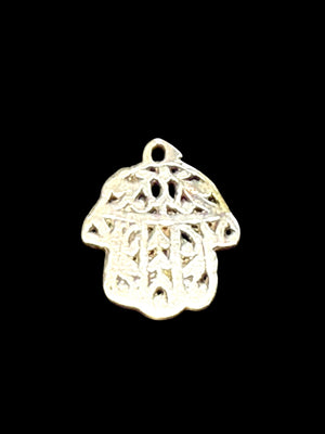 Antique Tunisian silver hamsa amulet pendant. Cast openwork decoration, rounded outline, softened detail consistent with wear. Height 3.5 cm, width 2.6 cm