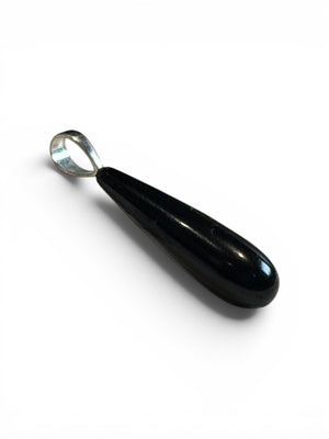 Simple, elegant pure black polished Mexican onyx teardrop pendant finished with a sterling silver bail. Length including bail 4 cm
