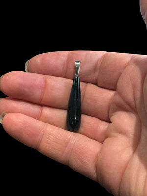 Simple, elegant pure black polished Mexican onyx teardrop pendant finished with a sterling silver bail. Length including bail 4 cm
