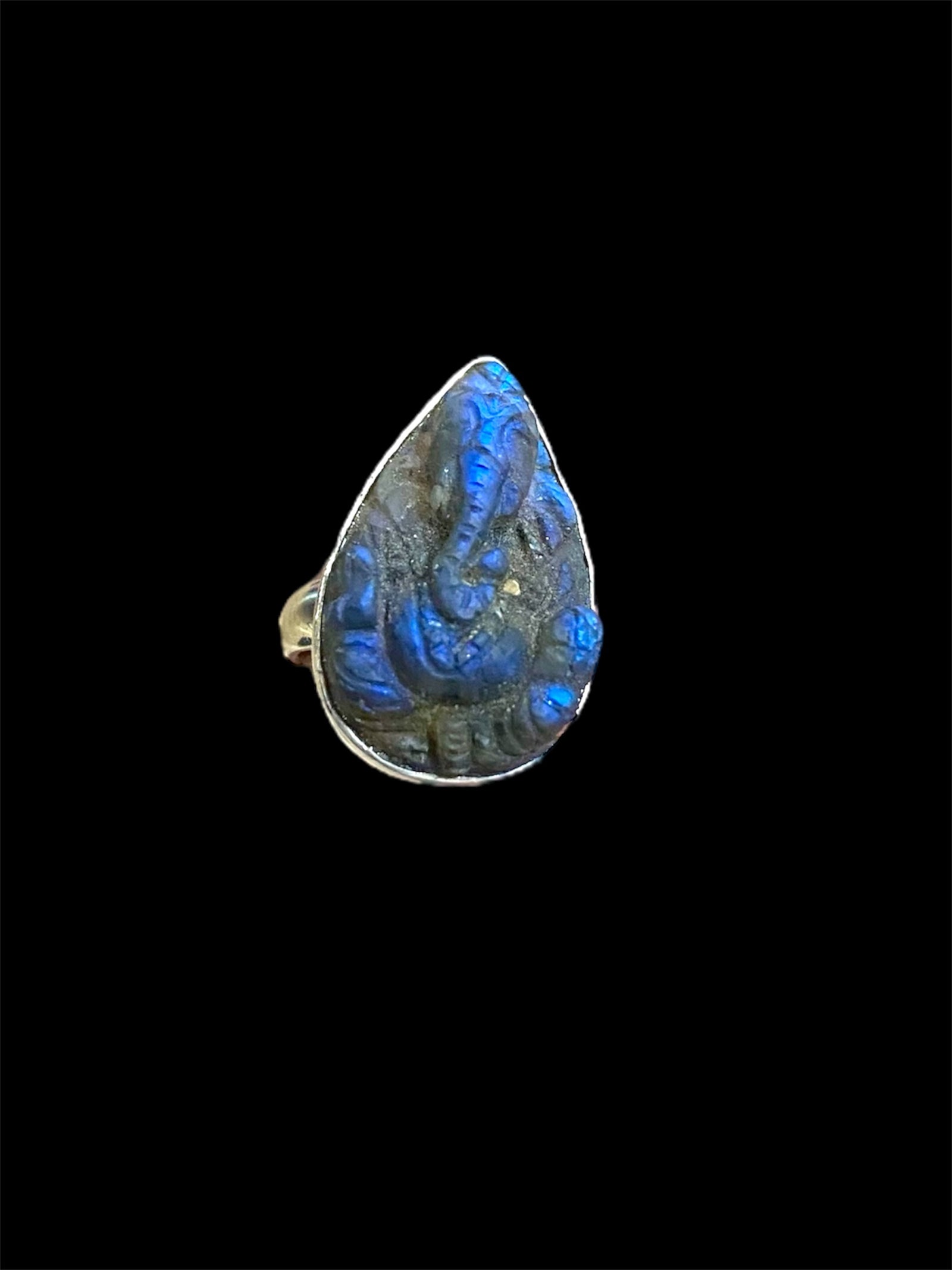 Very dark, hand carved labradorite ring with deep fire featuring Ganesh. Sterling silver. Stone length 2.4 cm, width 1.5 cm, US Size 6.75 | 17.25 mm