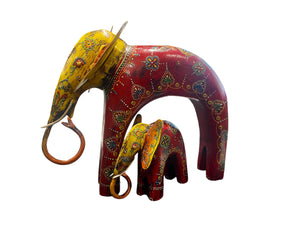 Hand made from hard wood and recycled iron, our beautiful elephant statues are painted in bright embossed detail. Large: height 27 cm, length 32 cm, depth 12 cm. Small: height 12 cm, length 15 cm, depth 6 cm